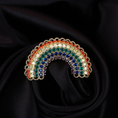 Rainbow zircon arch brooch on black silk